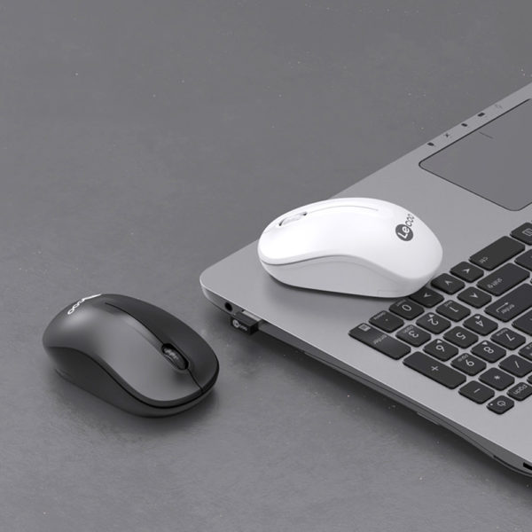 Hand resting on the Lecoo wireless mouse, showing ergonomic design